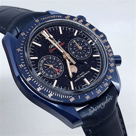 omega speedmaster moonphase blue.